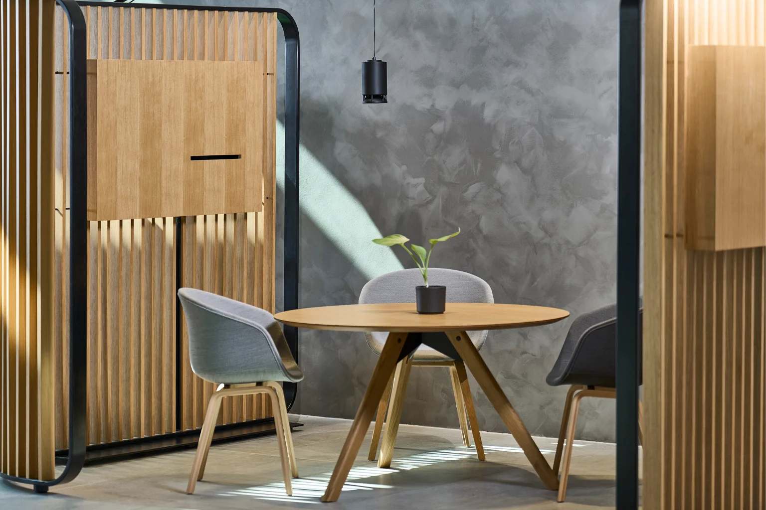Spottune Omni Cord Black in an Office meetering room